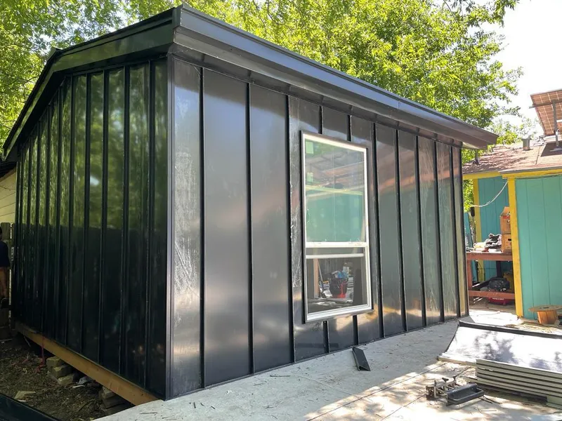 Black standing seam metal wall panels for Metal Roof Installation in Abington